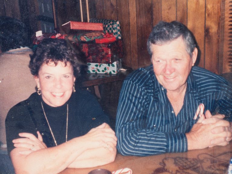 Lucille and Sonny Tillman sit at a table at Sonny's BBQ