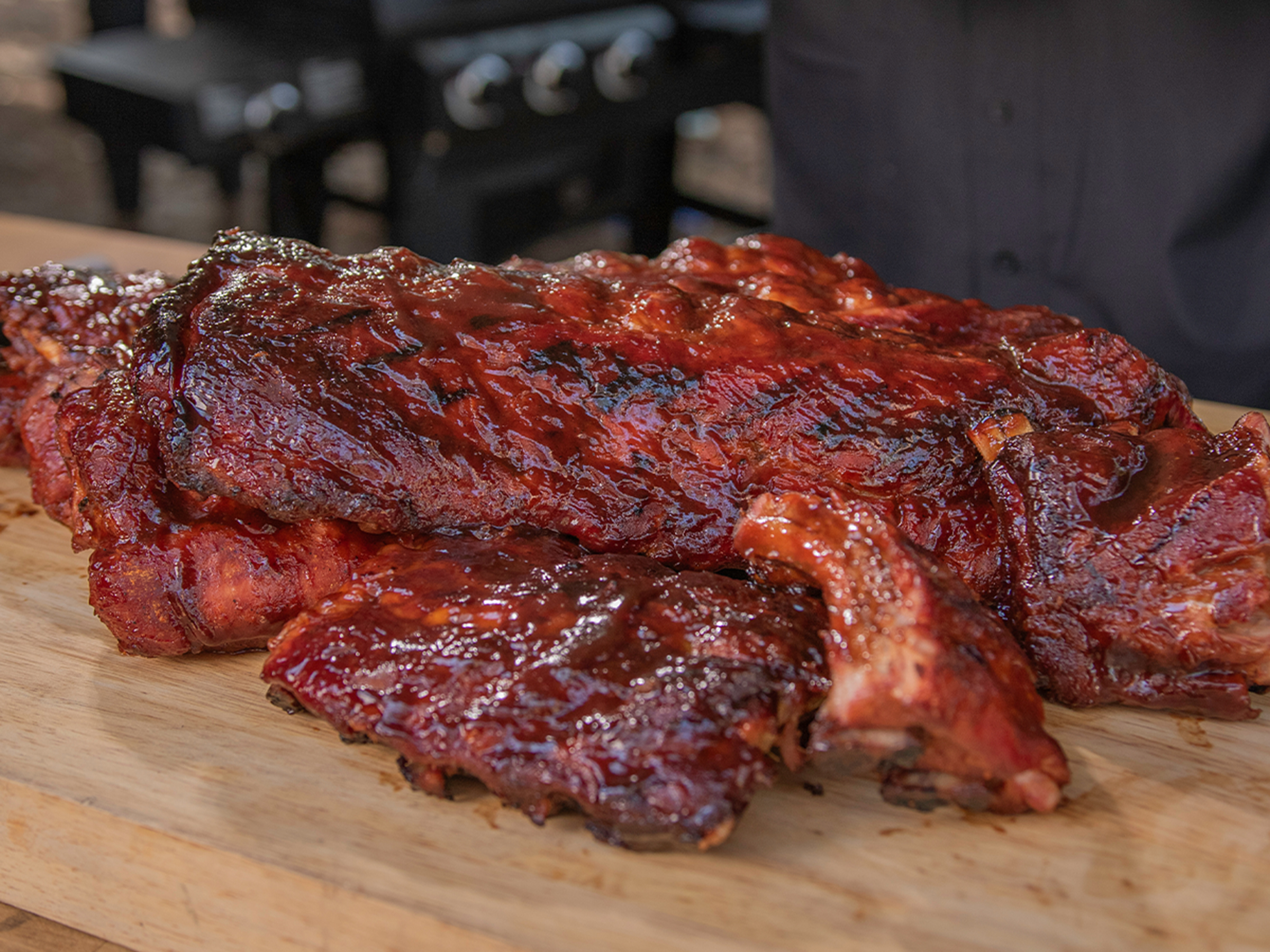 Racks of Baby Back Ribs sit on table