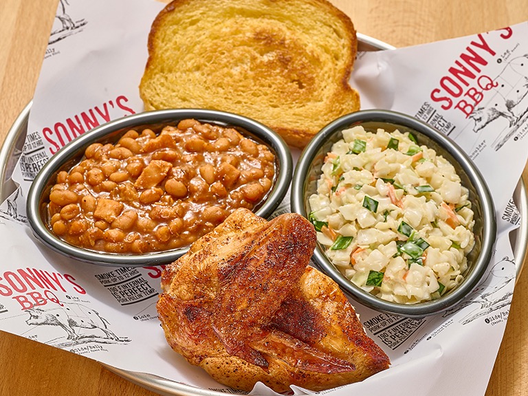 Smoked quarter chicken Pitmaster Lunch Plate with two sides at Sonny's BBQ