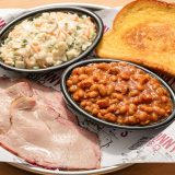 Sliced pork Pitmaster Lunch Plate with two sides at Sonny's BBQ