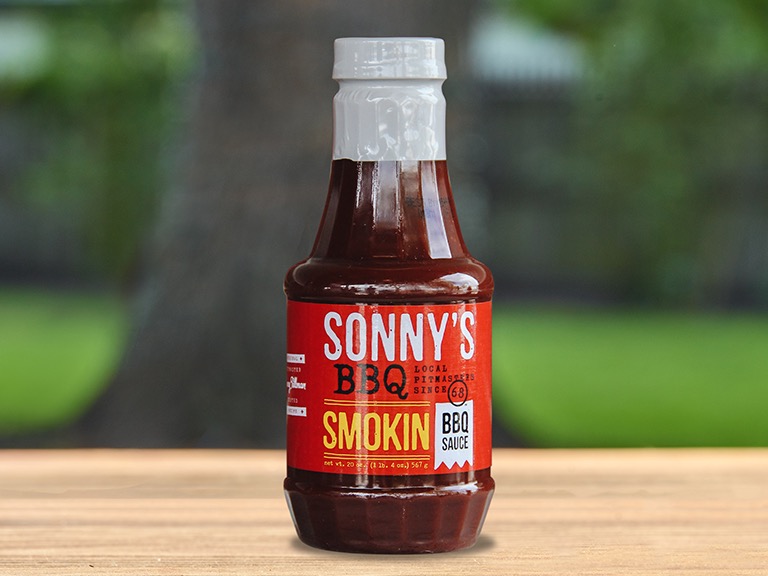 A bottle of Sonny's BBQ Smokin' BBQ sauce