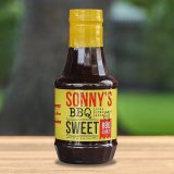 A bottle of Sonny's BBQ Sweet BBQ sauce.