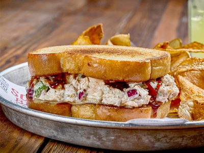 A smoked chicken salad melt sandwich at Sonny's BBQ