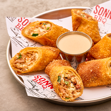 Free Pork Egg Rolls with any entrée