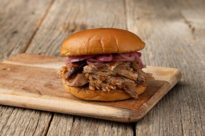 Summer Seasonal Menu Tennessee Vinegar Pork Sandwich at Sonny's BBQ.
