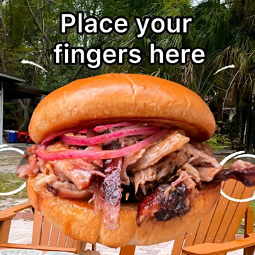 A giant Pork Sandwich with pickled onions stays on the screen while a yard spins in a circle behind