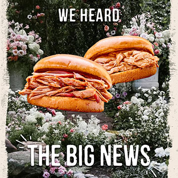 Two sandwiches sit in front of flower field, with text reading 