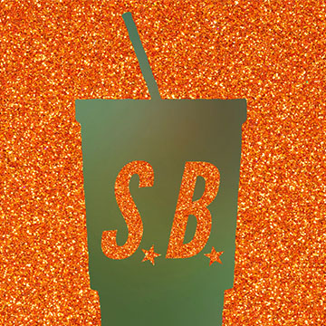 Green cup silhouette sits in front of orange glitter background with the initials S.B. on the cup