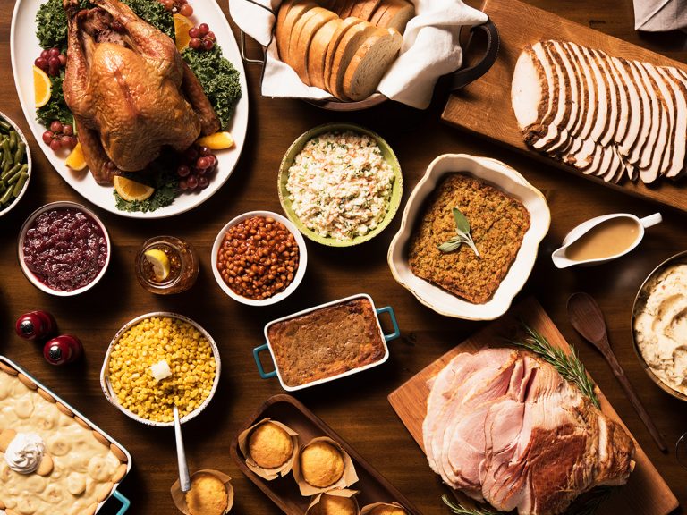 Overhead shot of Sonny's Holiday Feast offerings, including the meats featured in this holiday ham & turkey guide.