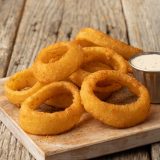 Onion rings, beer-battered and seasoned with dry-rub from Sonny's BBQ.
