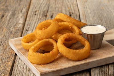 Onion rings, beer-battered and seasoned with dry-rub from Sonny's BBQ.