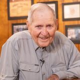 Sonny Tillman smiles at camera at Sonny's BBQ in Gainesville.