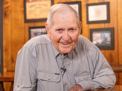 Sonny Tillman smiles at camera at Sonny's BBQ in Gainesville.