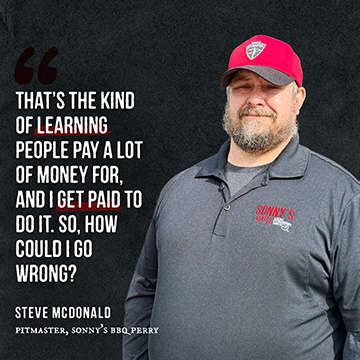 Pitmaster smiles at camera with quote beside him