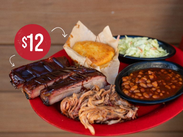 $12 Price Tag with arrows pointing to Pork & Rib Combo someone is holding up in front of Sonny's location