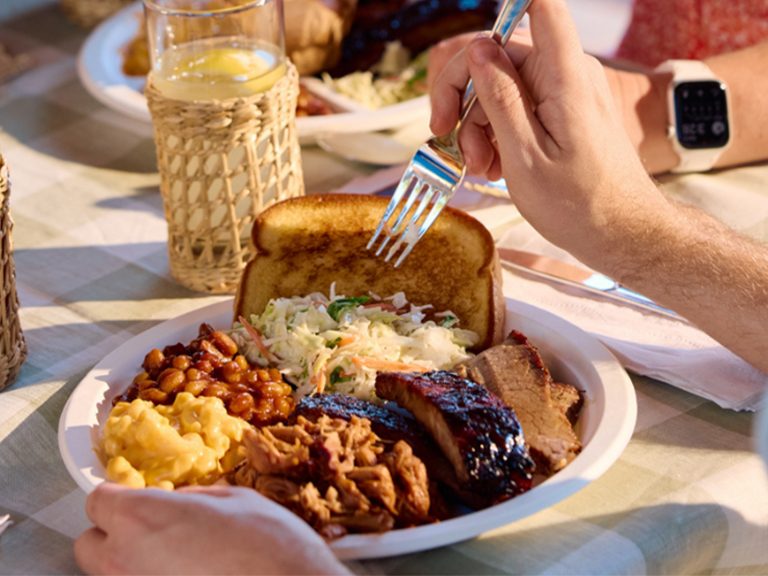 Plate full of BBQ on spring table