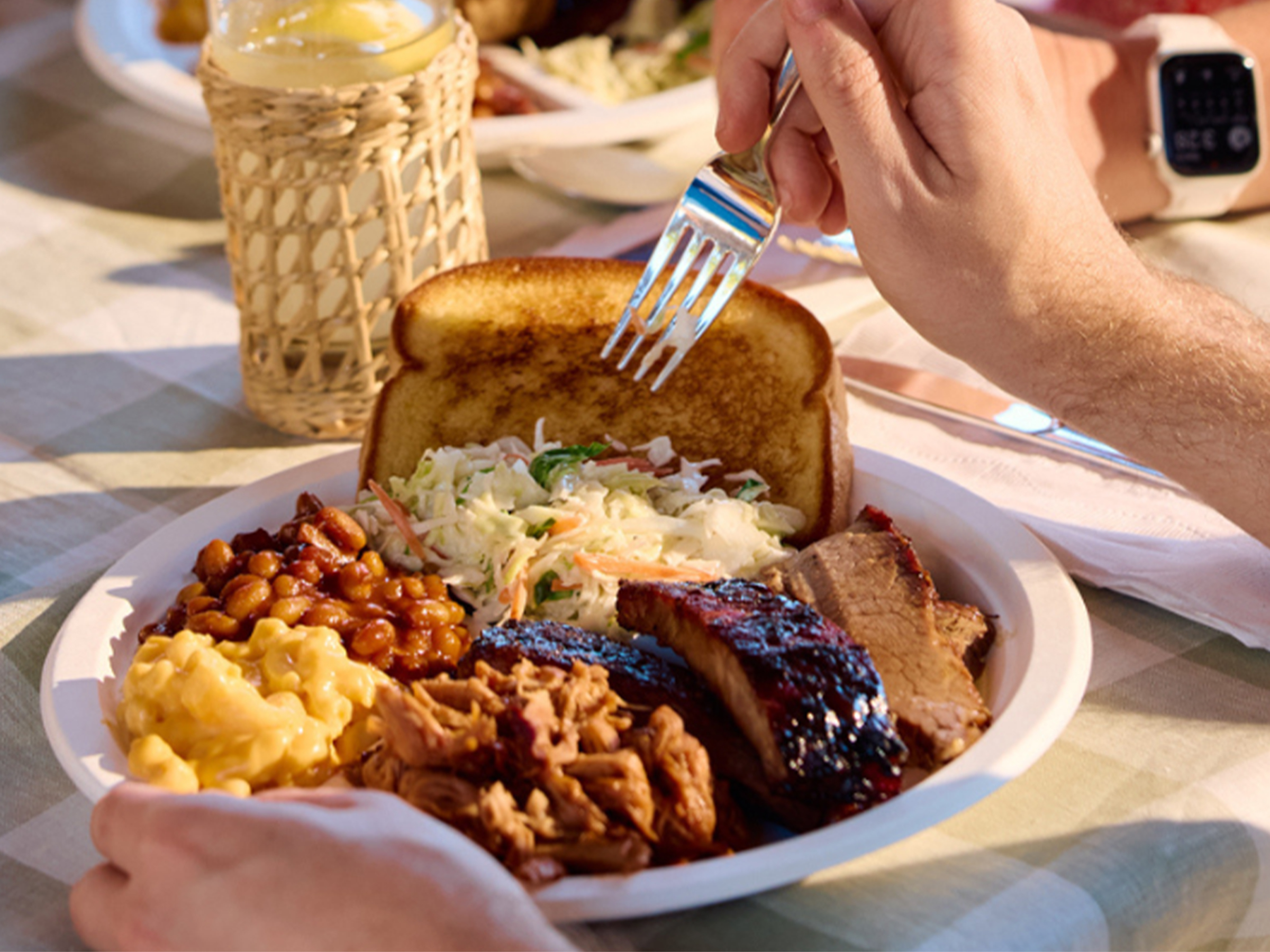 Plate full of BBQ on spring table