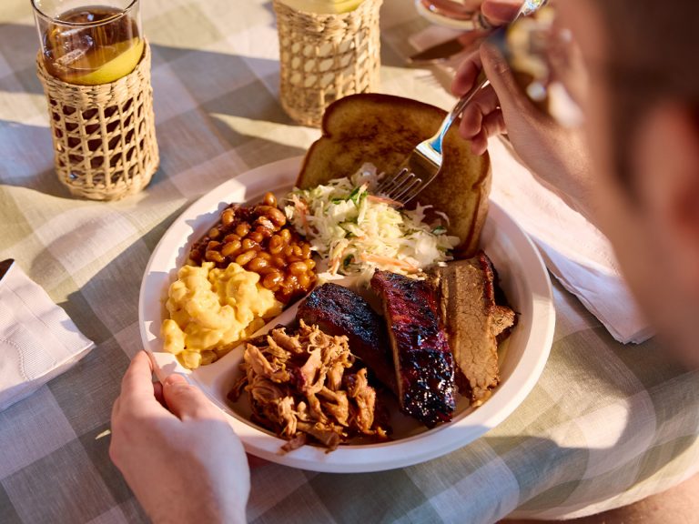 Plate full of BBQ on spring table