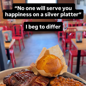 Plate of bbq in foreground with text reading 