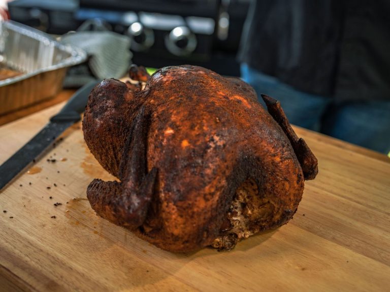 Smoked Turkey sits on Cutting Board