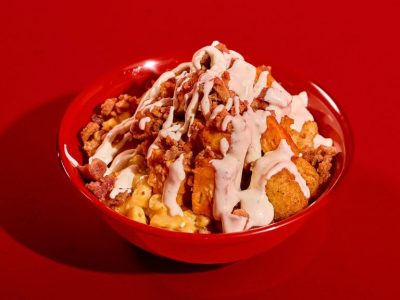Sonny's Kickin' Chicken Bowl on Red Table.